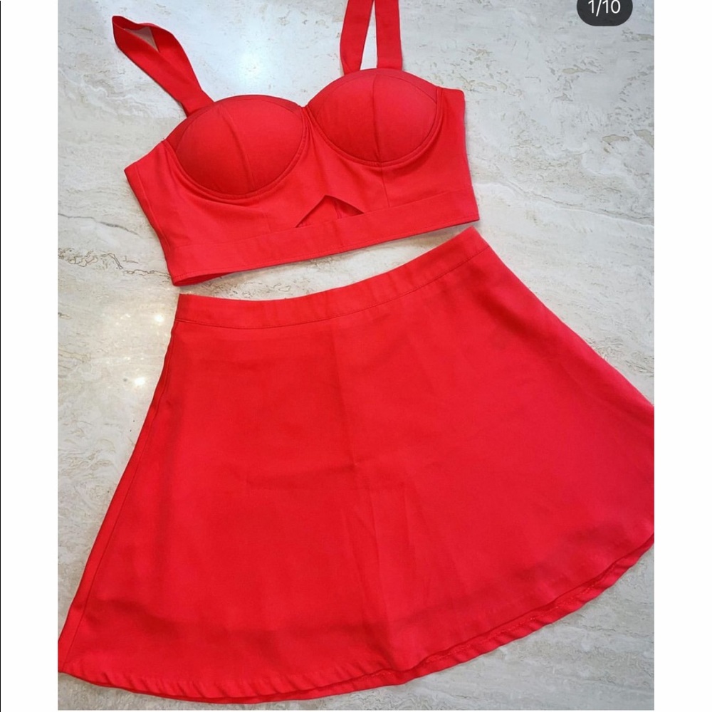 Gently worn two piece set. Skater skirt and crop top.